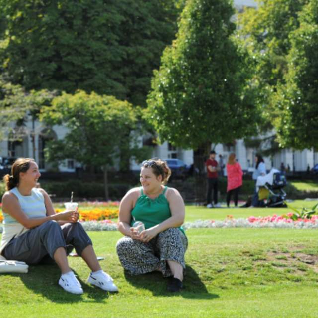 Ladies sat in Imperial Gardens in Cheltenham