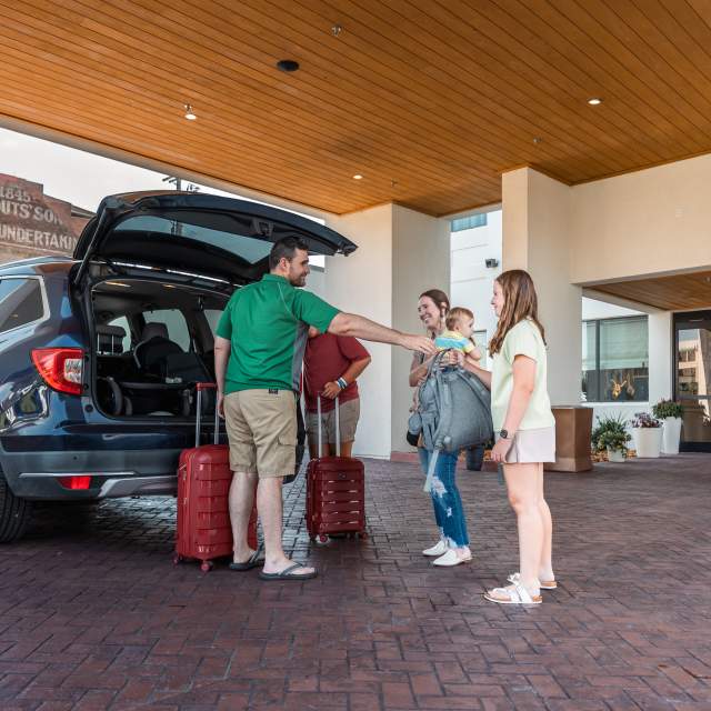 Family checking in at DoubleTree hotel in Clarksville, TN.