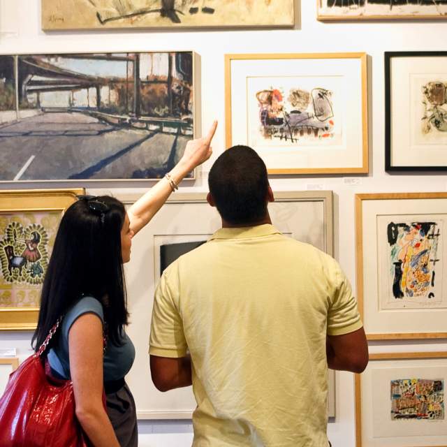 Couple looking at art on a wall