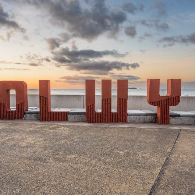 Colwyn Bay sign sitting on the promenade