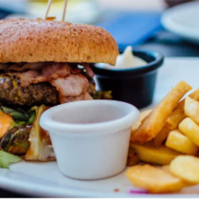 A burger and chips on a plate