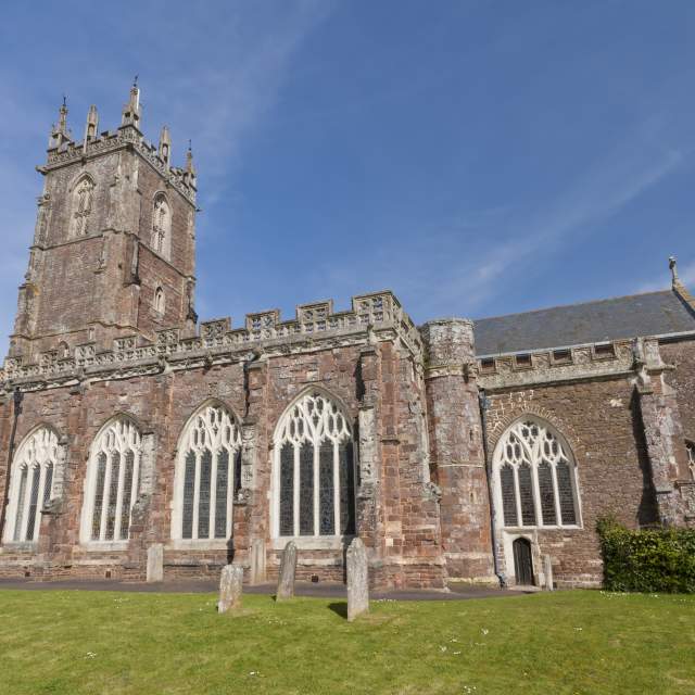 The image shows St Andrew's Church in Cullompton, Devon, England