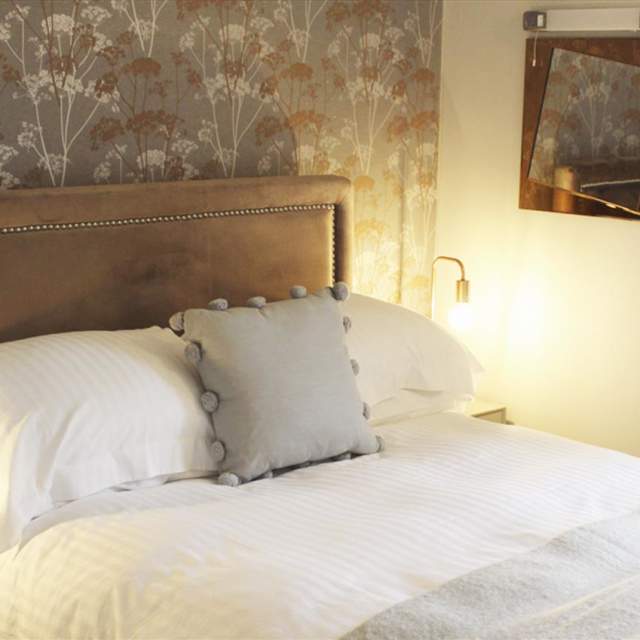 double bed in a hotel room