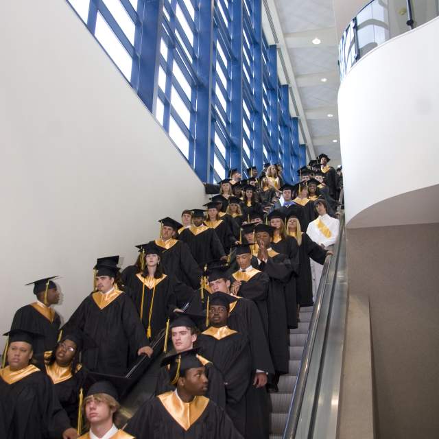 Photo of graduates lined up on stairs