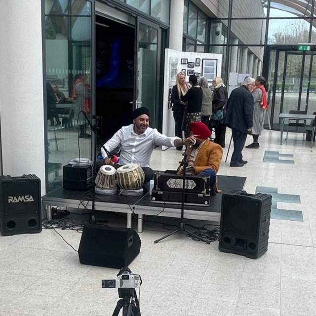 Sikhs play the drums in the Hull History Centre for Sikh new year