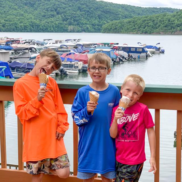 a trio of young boys enjoying ice cream at the Lake Raystown Resort Marina