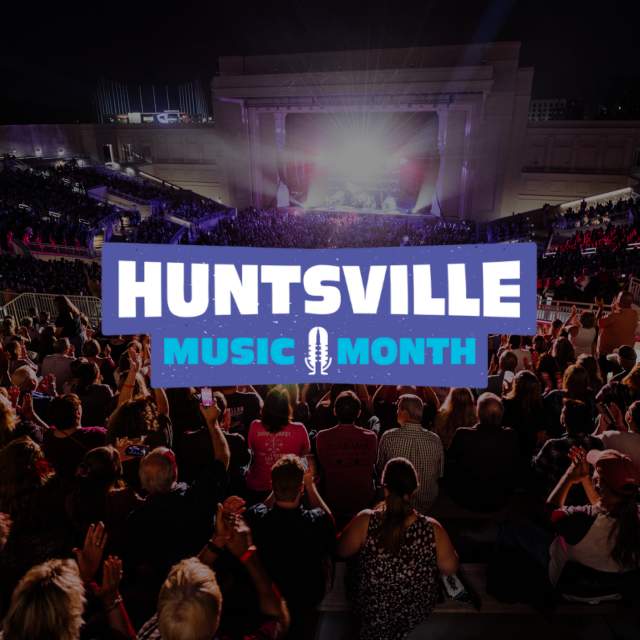 Logo in the center with the words Huntsville Music Month against a background image of The Orion Amphitheater during a concert. Shows hundreds of people looking in the direction of a brightly lit stage.