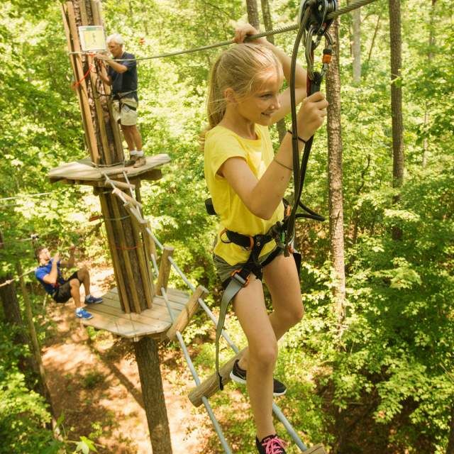 A Child On A Zipline At Go Ape! located in Eagle Creek Park
