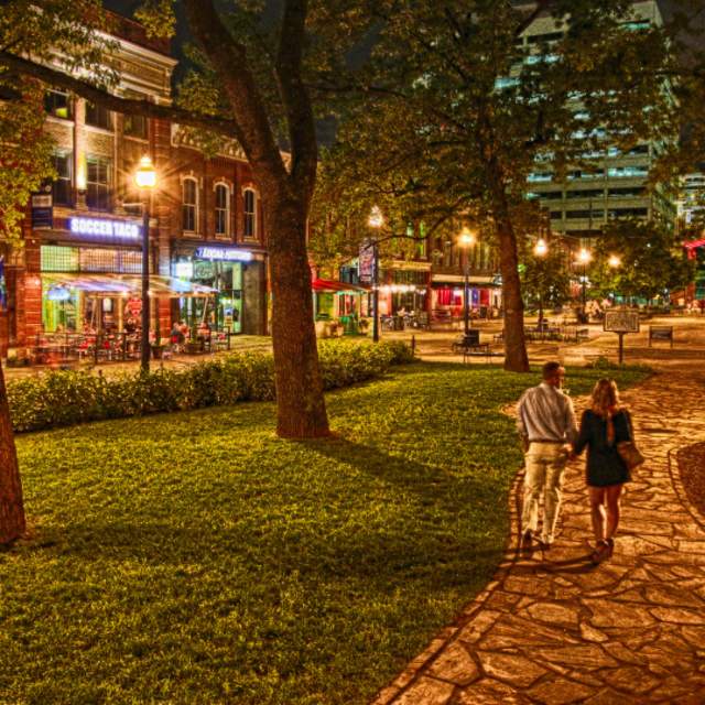 Couple Walking In Market Square In Knoxville, TN