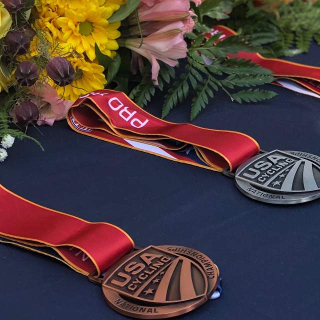 Olympic medals laid out on a table