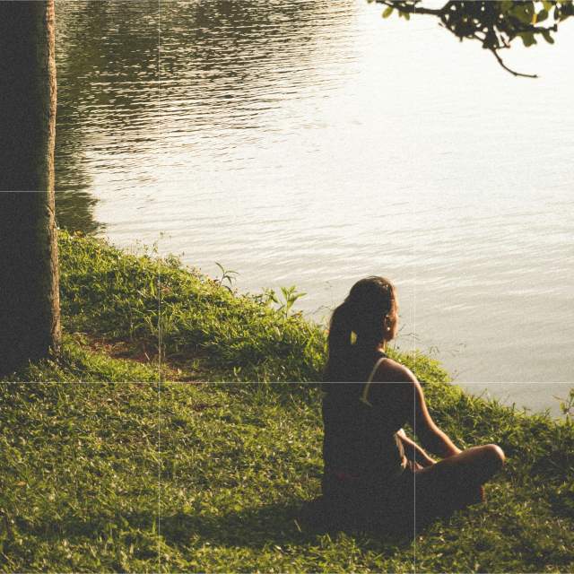 Woman by water