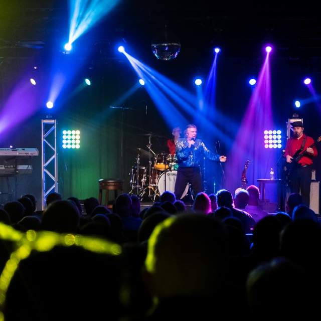 Performers on stage at the Belfry