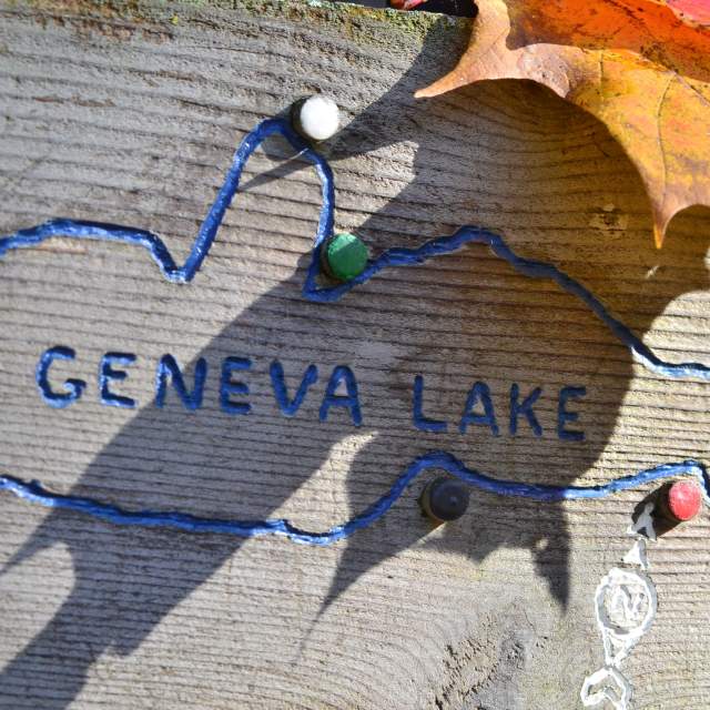 Map of Geneva Lake on a wooden board