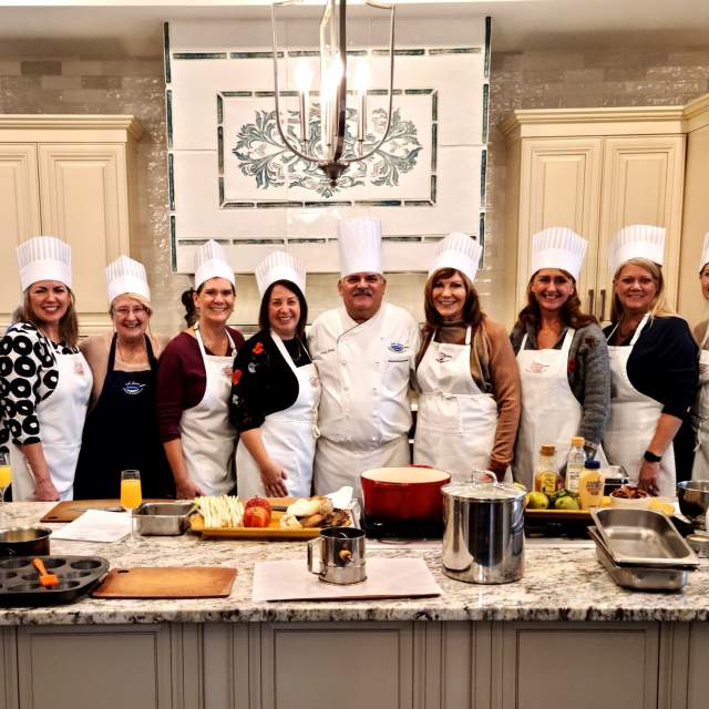 Group taking a class at the Lake Geneva School of Cooking.