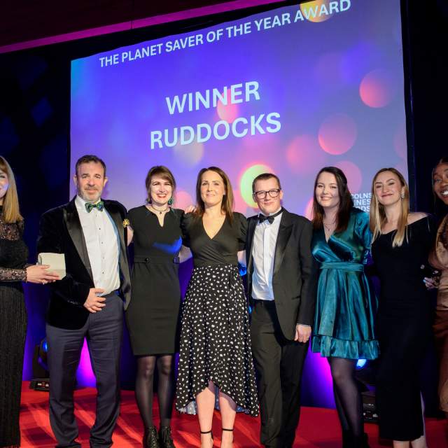 A team of people recieving an award.