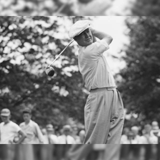 Man swinging a golf club over his shoulder
