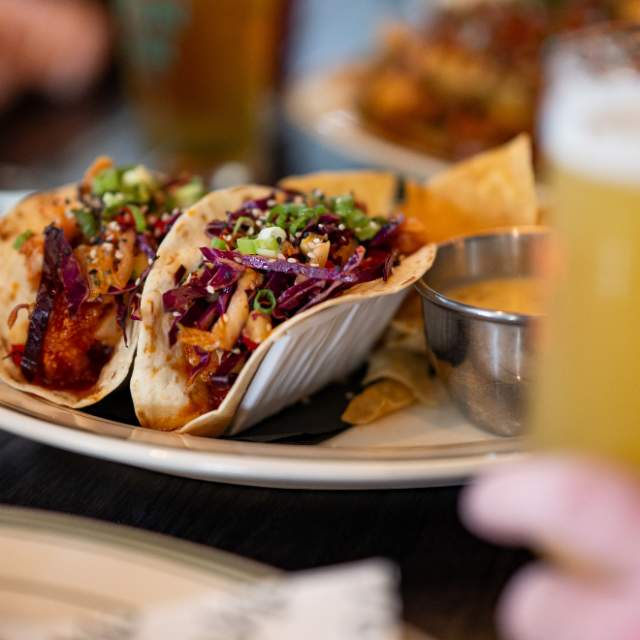 Two shredded pork tacos with a margarita at Union Bear