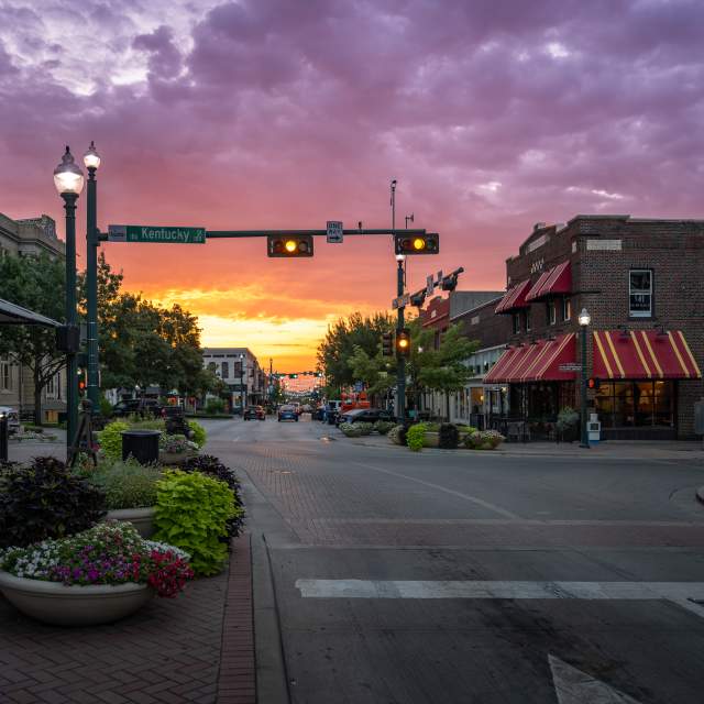 Sunset with purple, yellow, and orange over downtown McKinney
