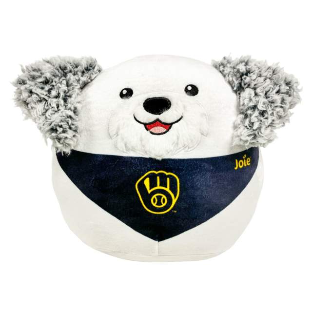 A plush white dog toy with fluffy gray ears and a smiling face, wearing a navy bandana featuring the Milwaukee Brewers logo and the name “Joie.”