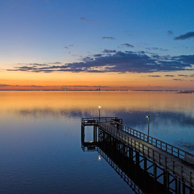 pier and water at sunset