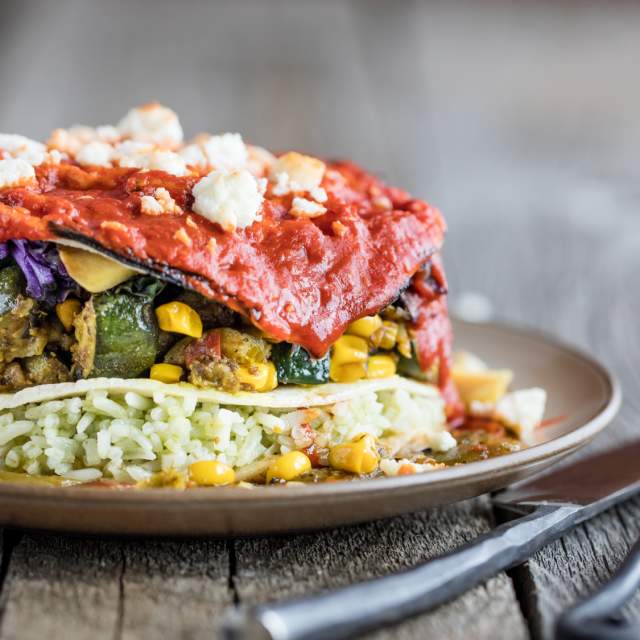 Locally-sourced corn, hatch chilies and red sauce make this dish a true New Mexico treat.