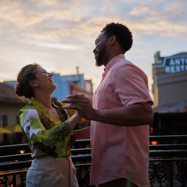 Couple Dancing on French Quarter Balcony