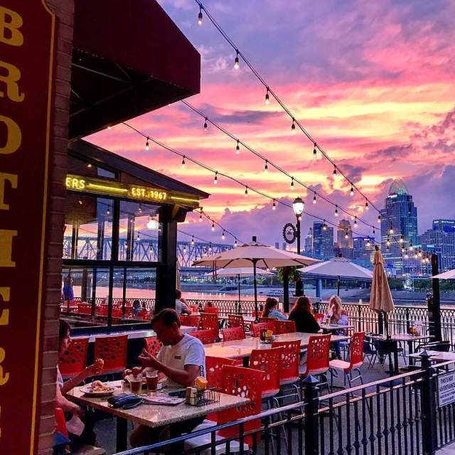 Pink and purple sunset over Cincinnati Skyline, seen from Brothers restaurant in Newport KY