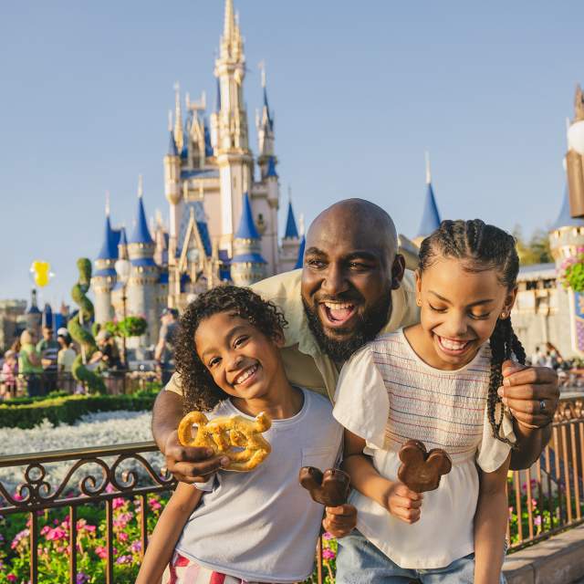 Family at Magic Kingdom castle