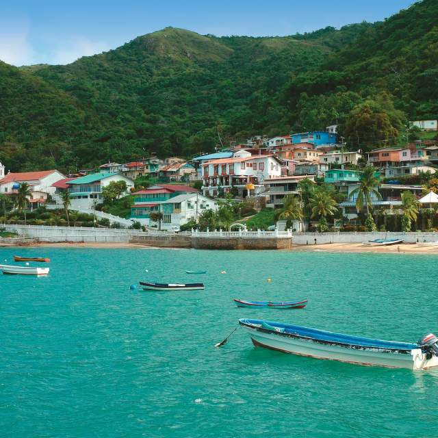 Beautiful view of Taboga Island town and beach in a sunny day