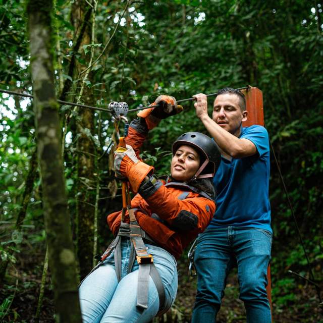 Woman doing zip line at Volcan, Chiriqui