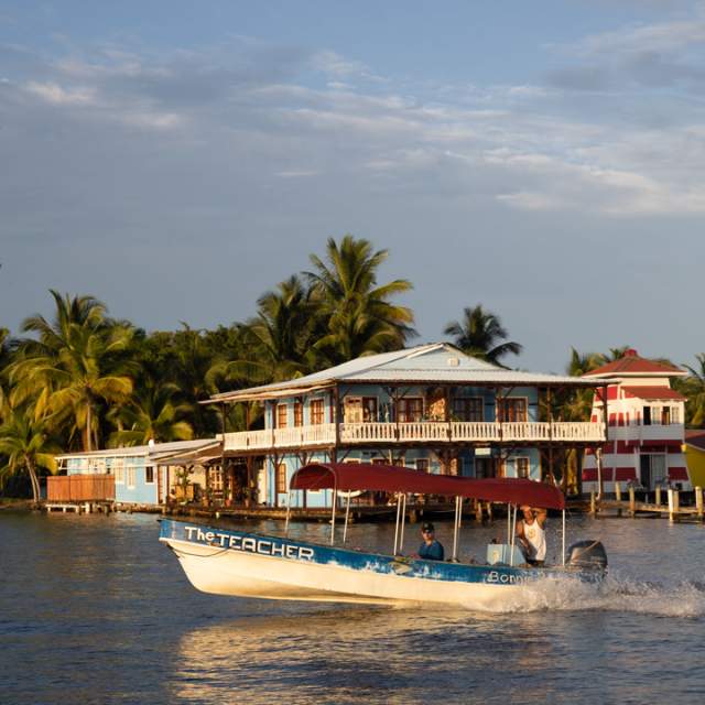 A view of Isla Colon with boats in a sunny day