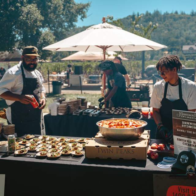 Heritage Fire Event. 2024 Napa. Men cooking food.