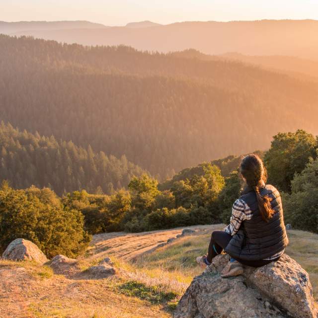 Girl looking out to the horizon at  La Honda Creek