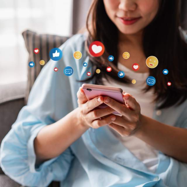 Woman on social media - stock image with icons
