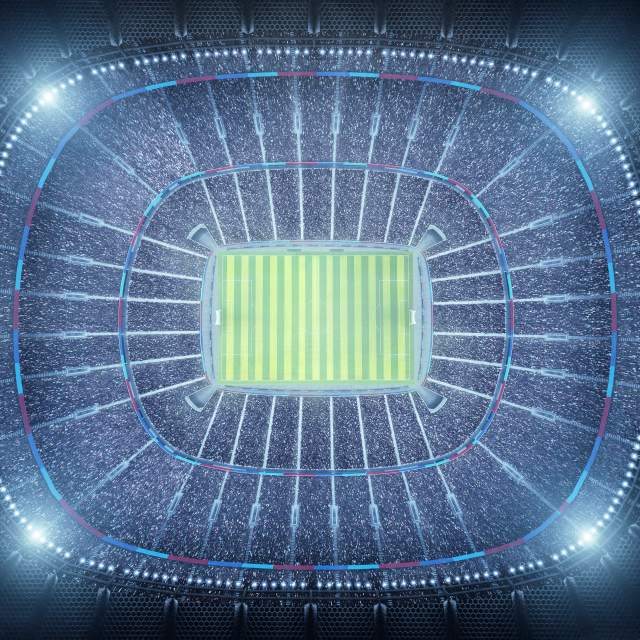 An aerial image of a packed stadium at night.