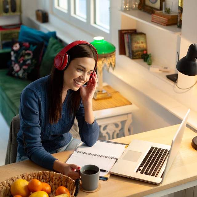 Woman joining a meeting at home