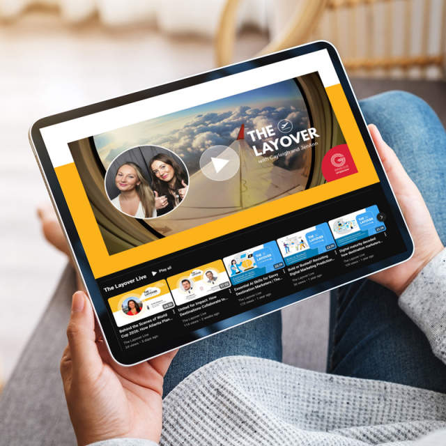 The main page of The Layover Live podcast with pictures of the hosts and a microphone.