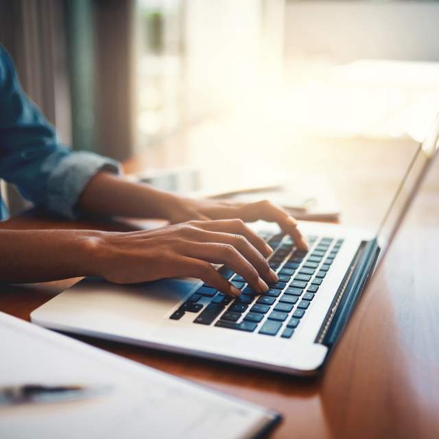 Woman using laptop for FuturePace