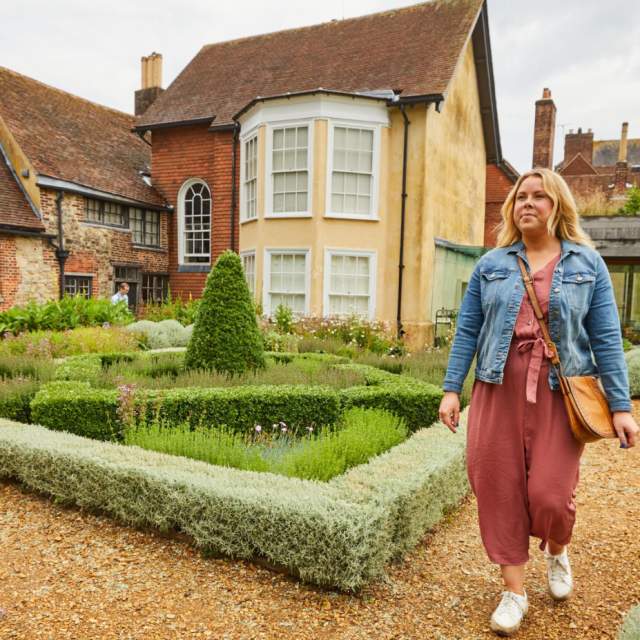 Women walking in the tudor house garden