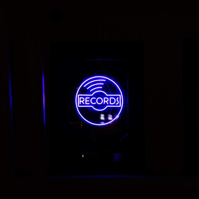 A neon sign at Full Bug Records