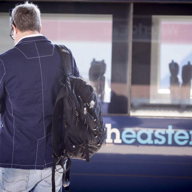 A passenger waiting for a Southeastern train