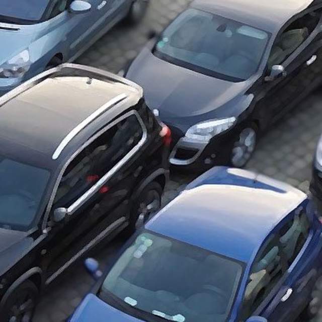 photos of cars in a car park