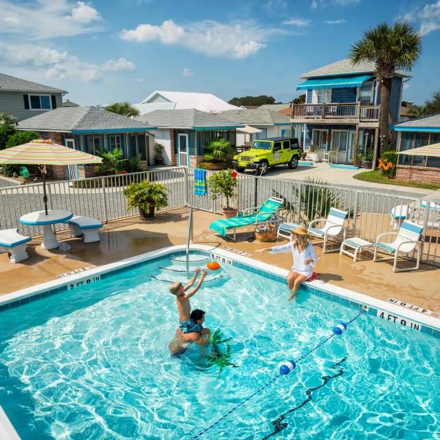 Family in Pool Kure Beach