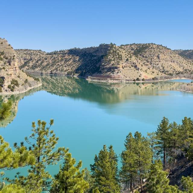 Located in the scenic high-desert of Platte County, Wyoming, Guernsey State Park is a 6,000-acre oasis that blends rugged natural beauty with a fascinating historical legacy.