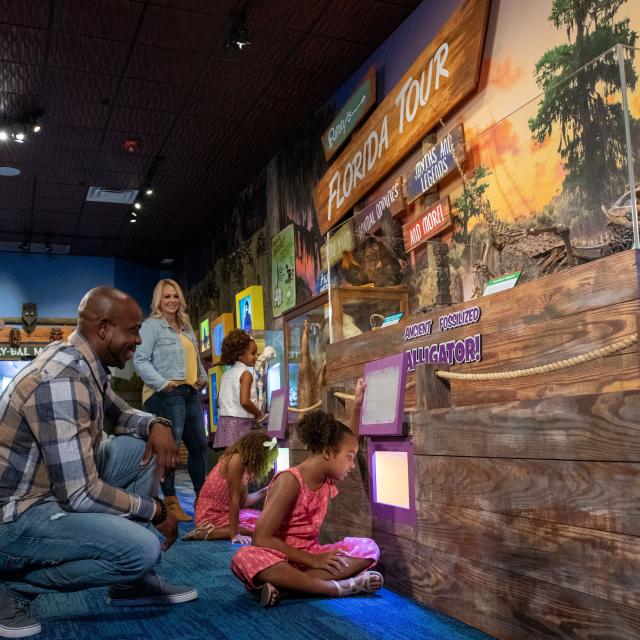 A family tours an exhibit at Ripley's Believe It or Not! Orlando.