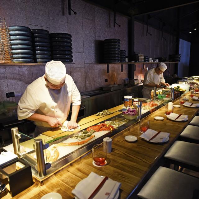 chef preparing sushi at Morimoto Asia