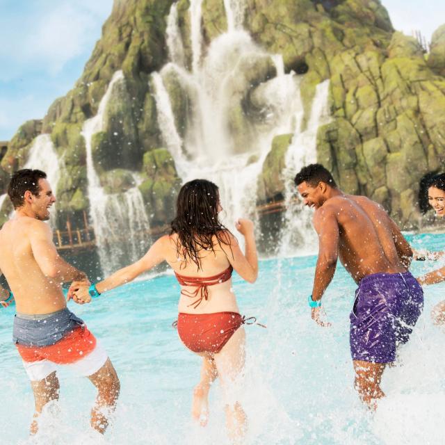 Couples at Waturi Beach at Universal's Volcano Bay