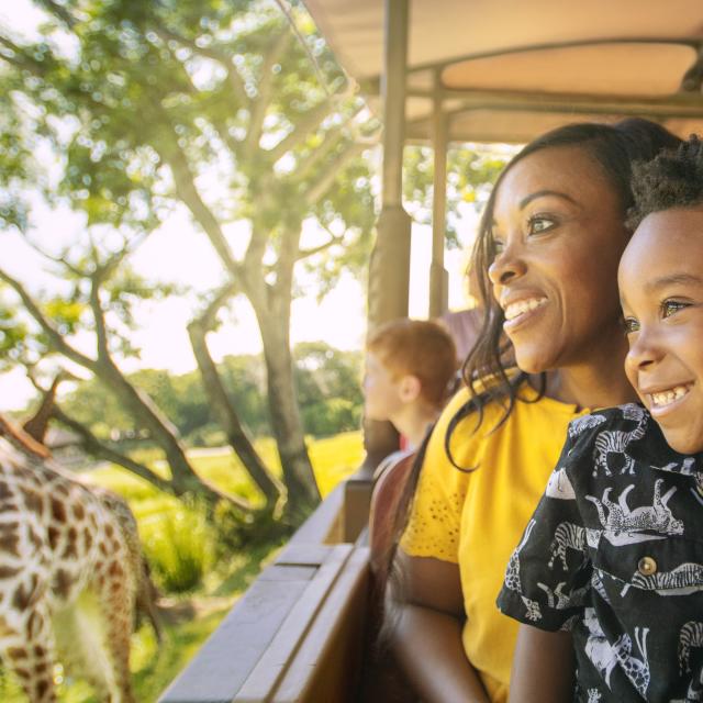 A mother and son on a Kilimanjaro Safari at Disney's Animal Kingdom® Theme Park