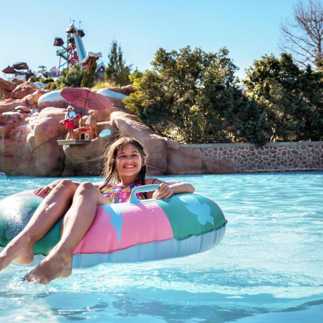 Young girl on a float at Disney's Blizzard Beach Water Park