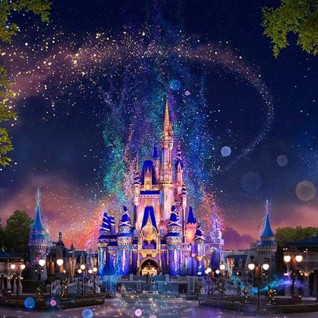 Walt Disney World Magic Kingdom Park Cinderella's castle surrounded by fairy dust